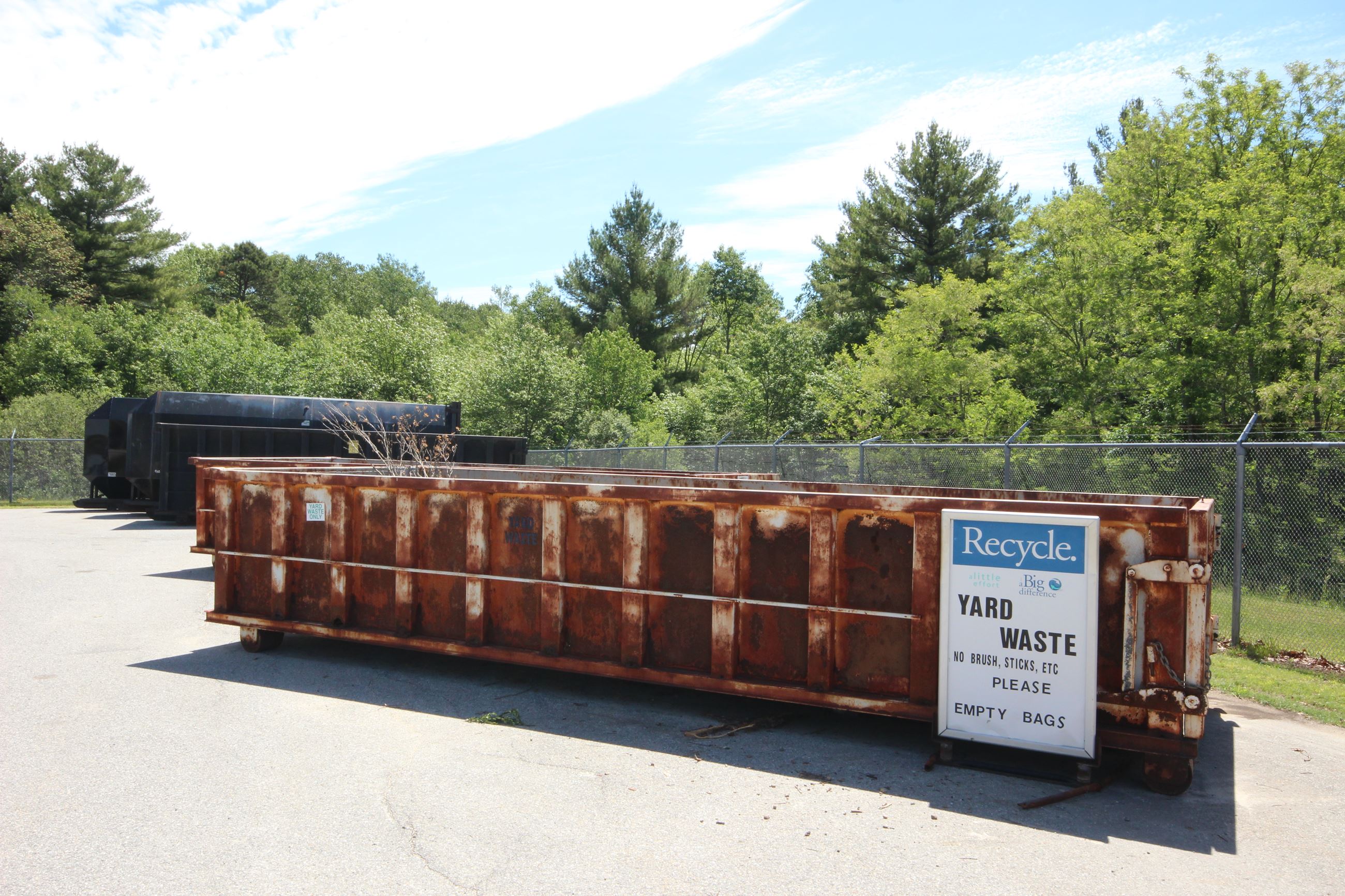 Yard Waste container with sign