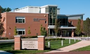 Howe Manning School brick storied building with lawn